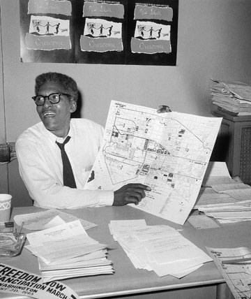 Bayard Rustin, deputy director of the March on Washington, points to a map showing the line of march for the Aug. 28, 1963, demonstration for civil rights.