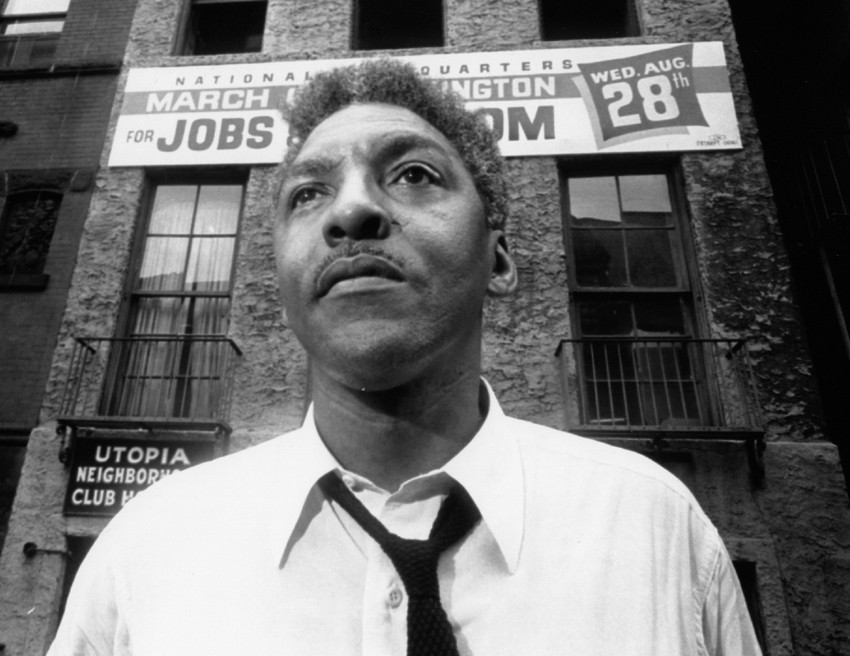 Bayard Rustin, leader of the March on Washington scheduled for August 28, poses in front of the National Headquarters at 170 West 130th St., in New York, August 1, 1963. 