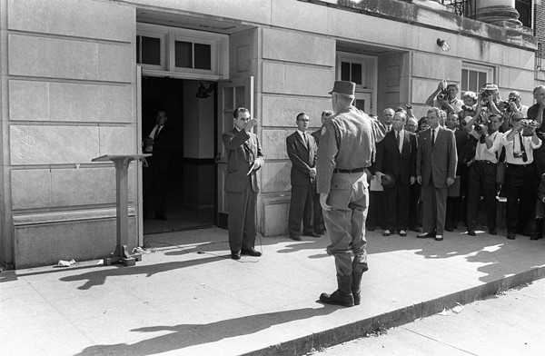 Alabama's governor George Wallace (left) faces General Henry Graham, in Tuscaloosa, at the University of Alabama, on June 12, 1963. Wallace blocked the enrollment of two Black students, Vivian Malone and James Hood. Despite an order of the federal court, Governor George Wallace appointed himself the temporary University registrar and stood in the doorway of the administration building to prevent the students from registering.