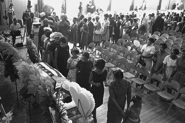 Mourners file past the open casket of slain civil rights activist Medgar Evers in Jackson, Mississippi, on June 15, 1963. On June 12, Evers was shot and killed outside his home by by Byron De La Beckwith, a member of the White Citizens' Council.